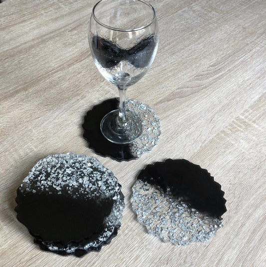 Black Pearl Radiance: Individual Black Resin Coaster with Silver Leaves - Geode Shape - 5in